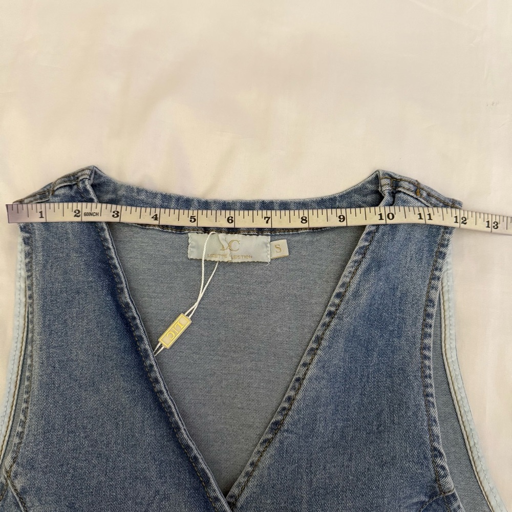 Light blue denim vest with buckle details on the sides - Picture 5 of 8